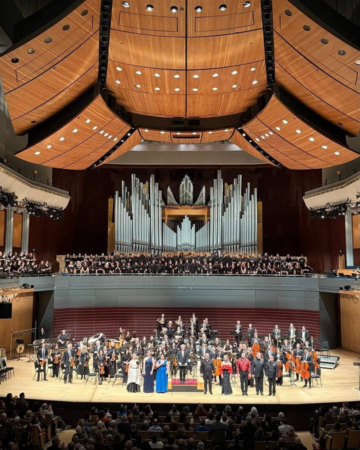 Concert hall ensemble and orchestra on stage